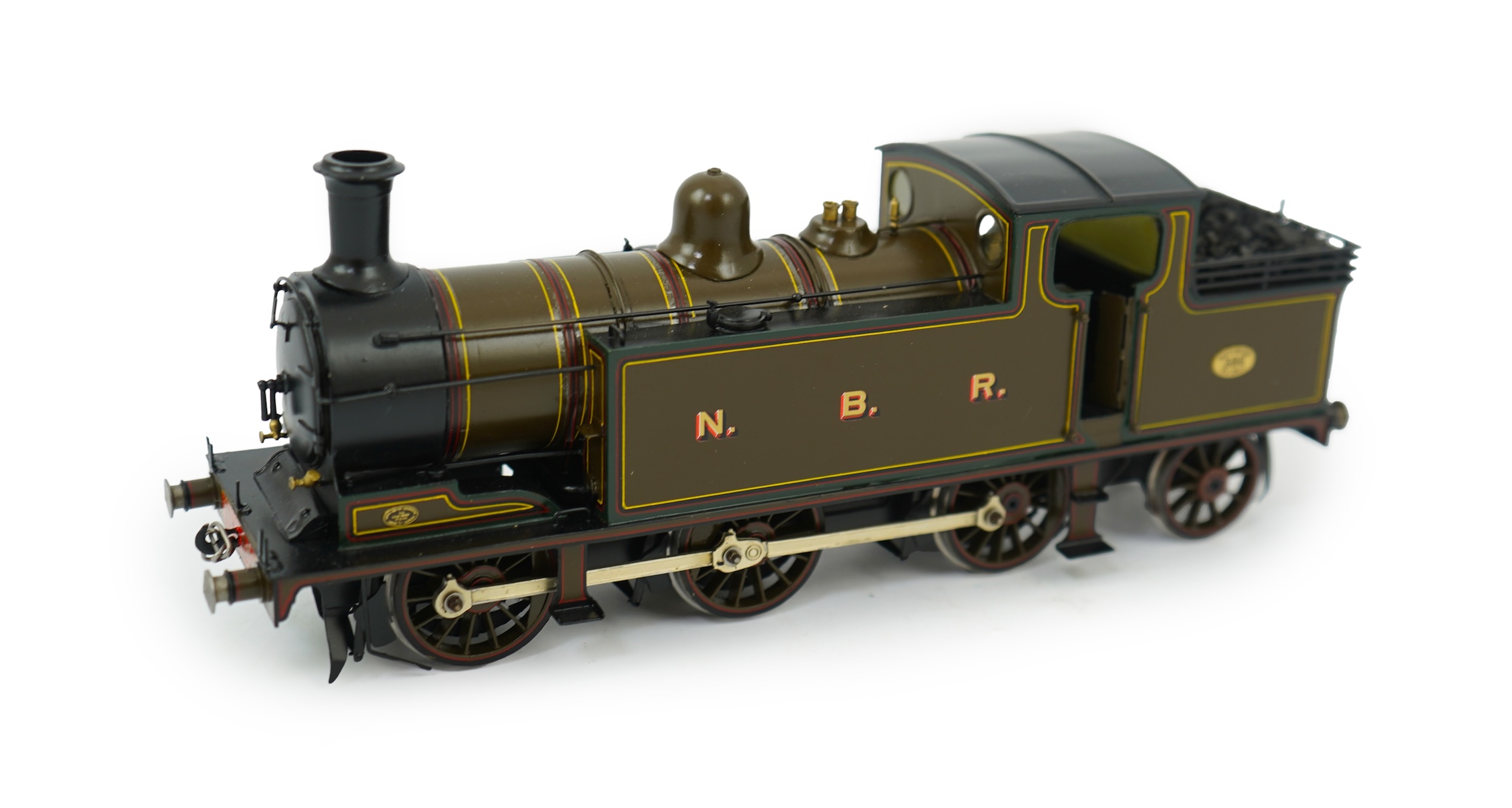 An 0 Gauge brass model of North British Railway William Reid Class A, 386, 0-6-2T locomotive, powered for two rail operation.